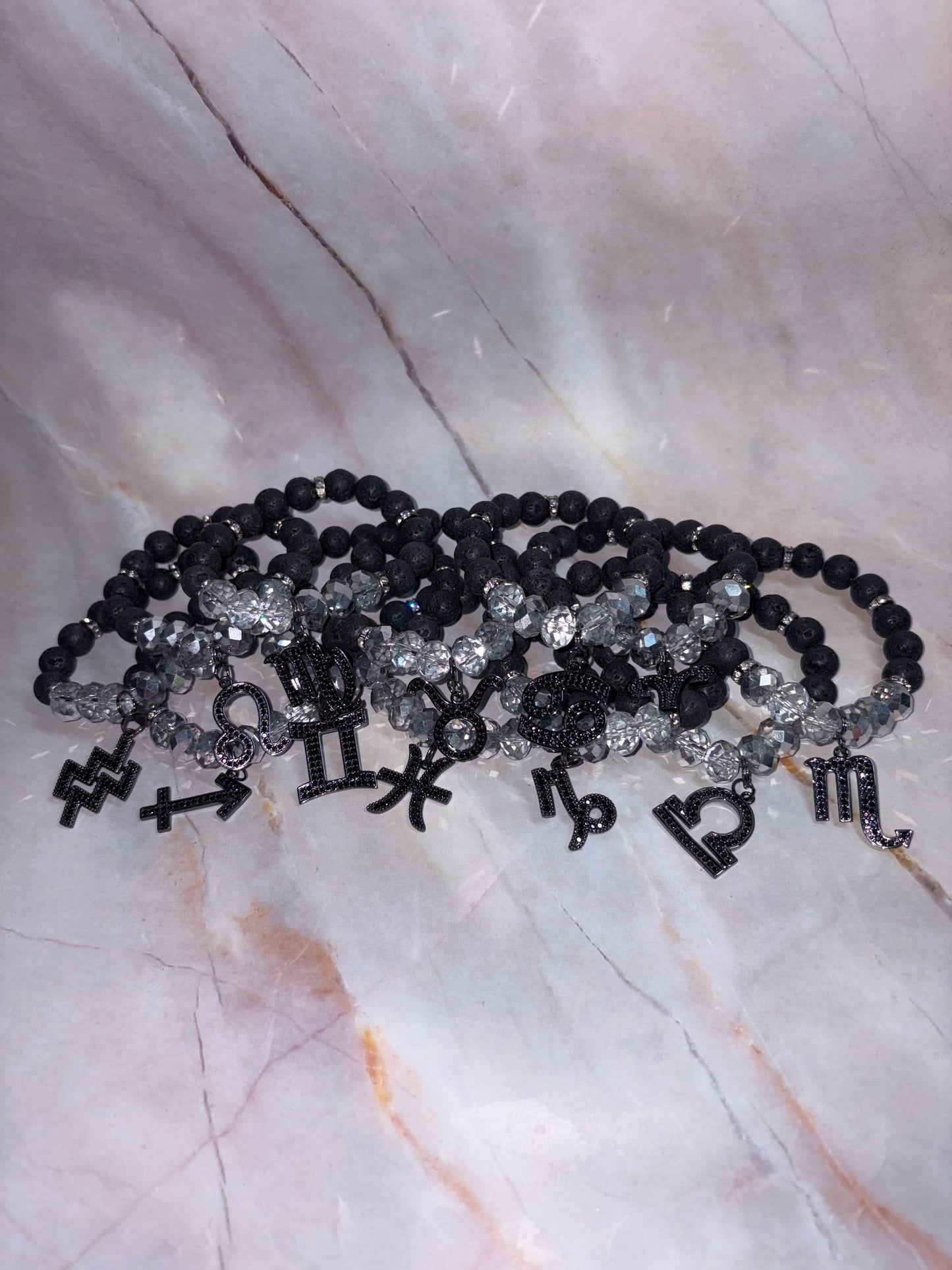 BLK Zodiac Bling Singles