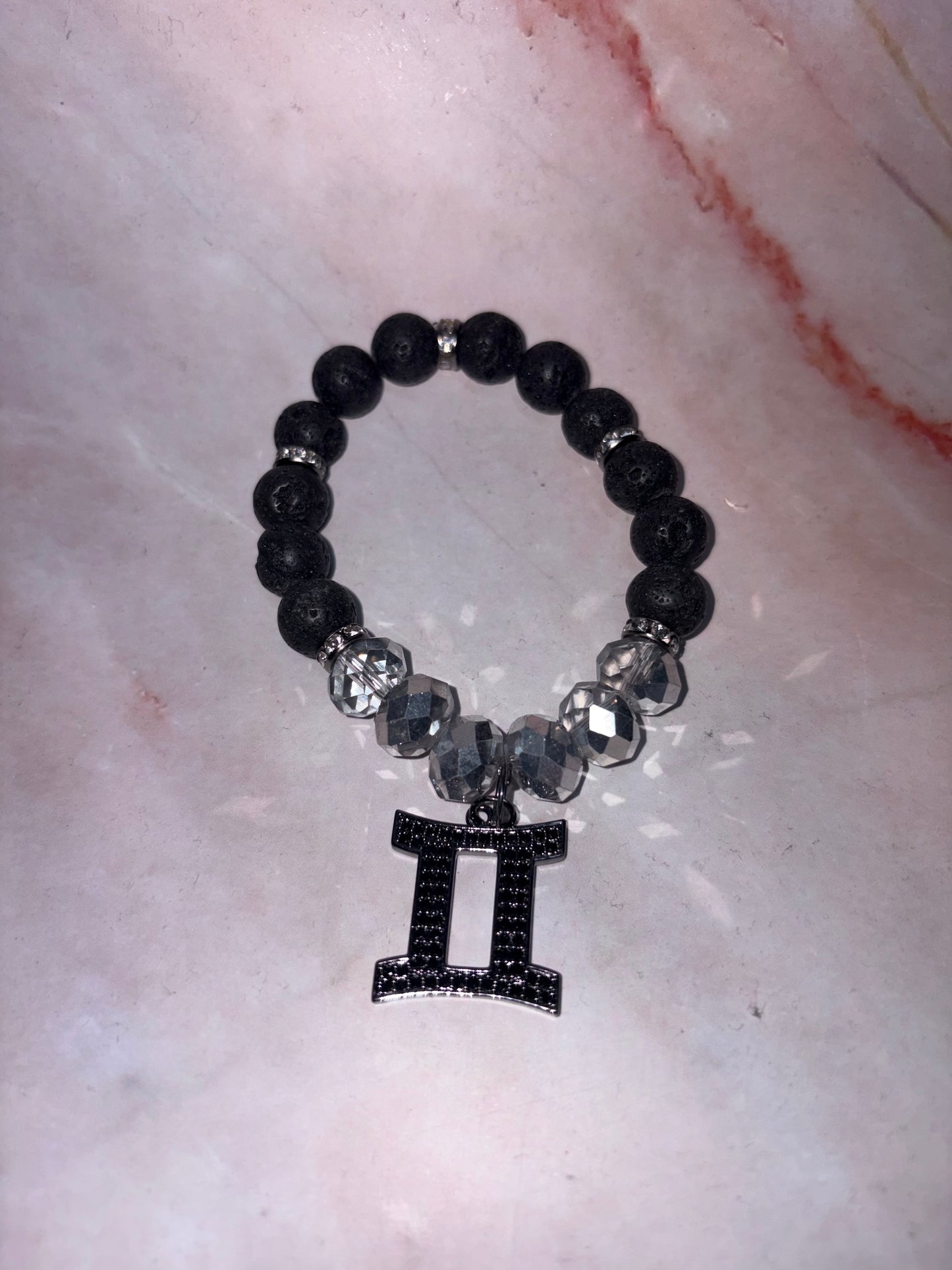 BLK Zodiac Bling Singles