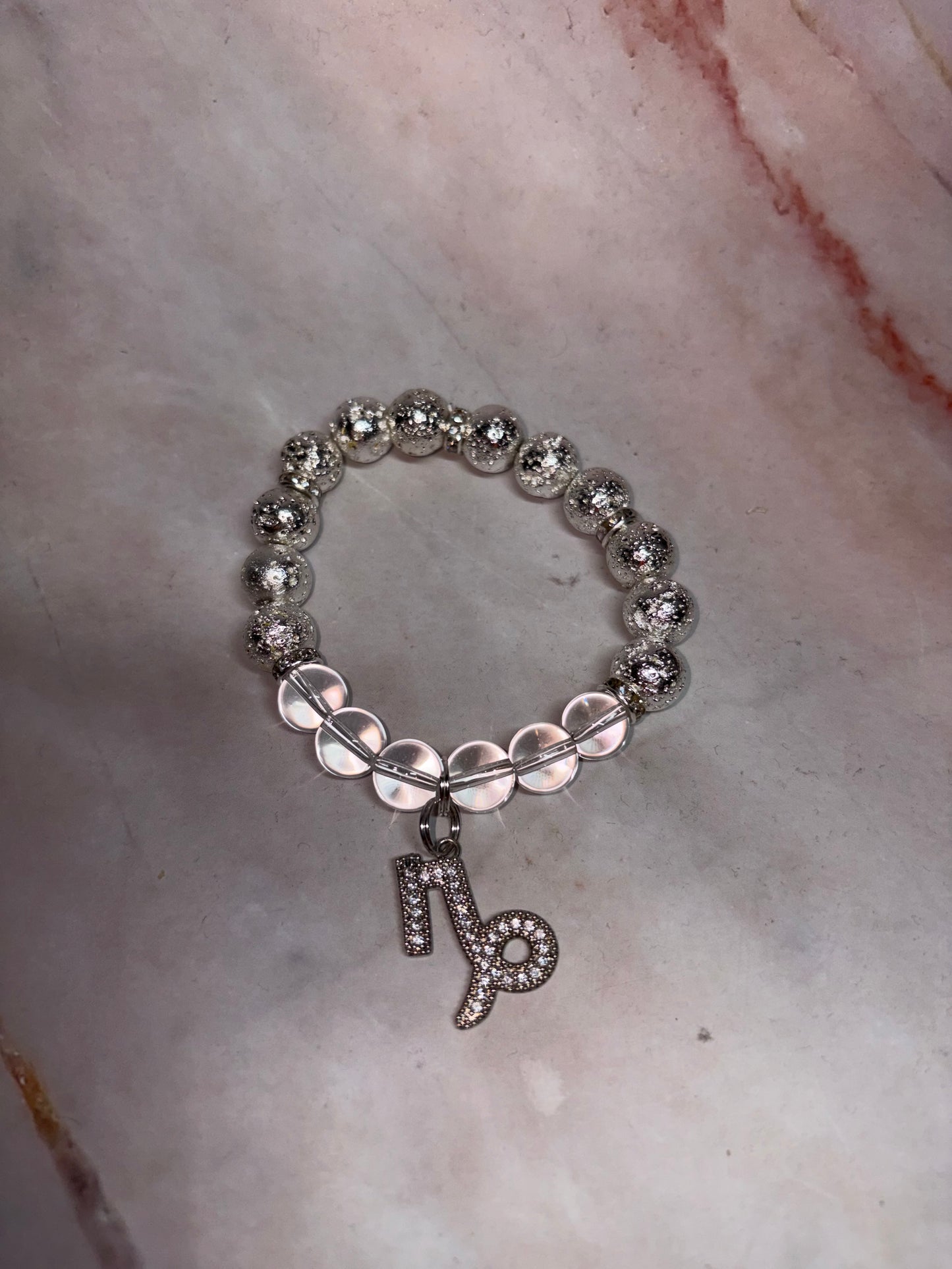 SIL Zodiac Bling Singles