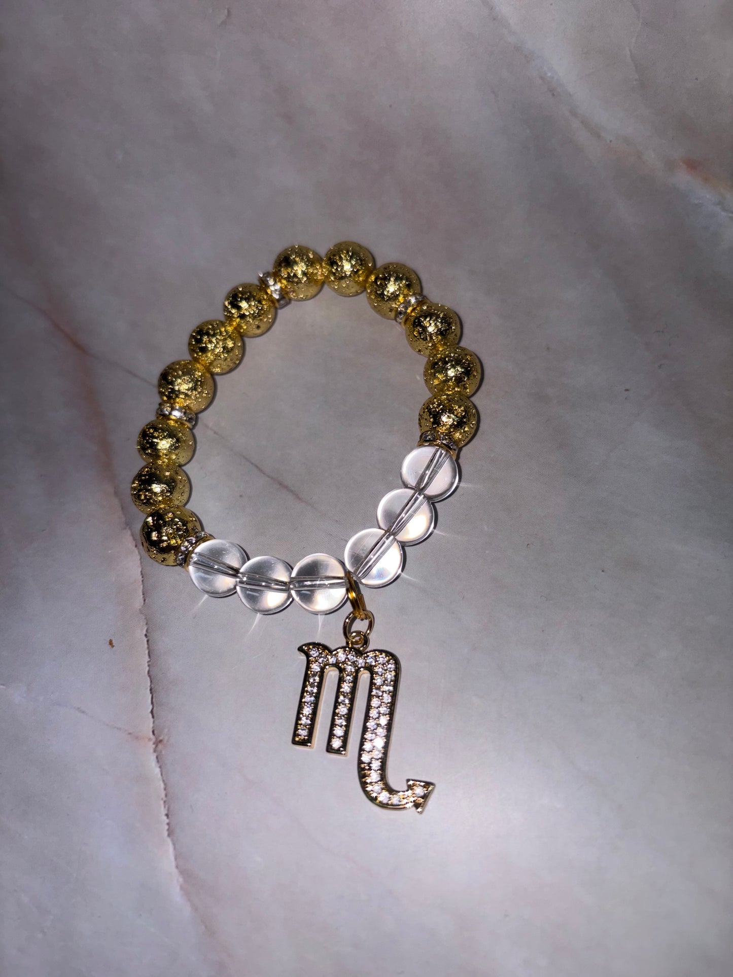 GLD Zodiac Bling Singles