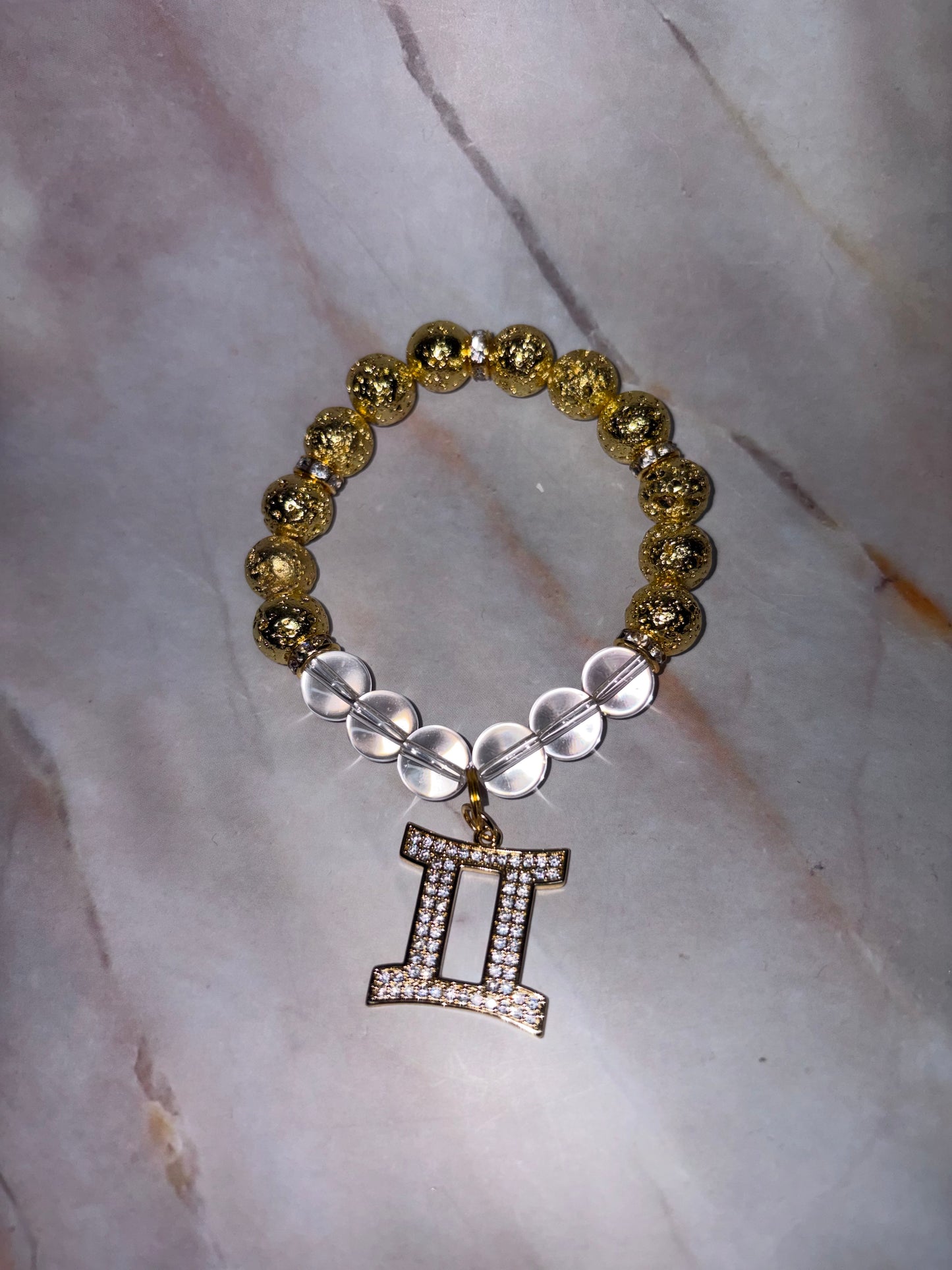 GLD Zodiac Bling Singles