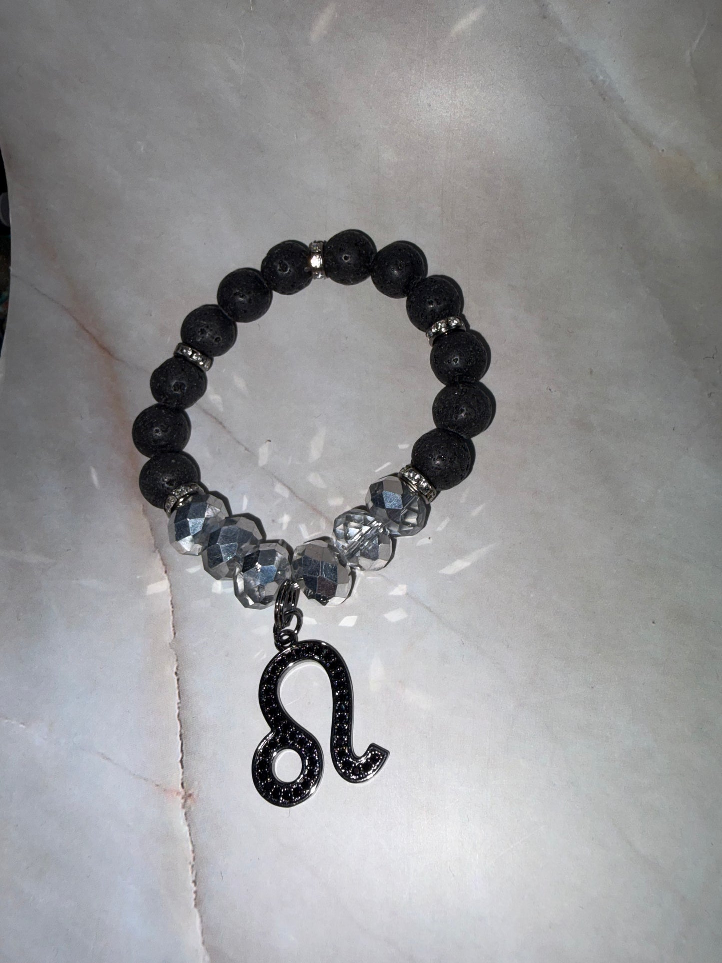 BLK Zodiac Bling Singles