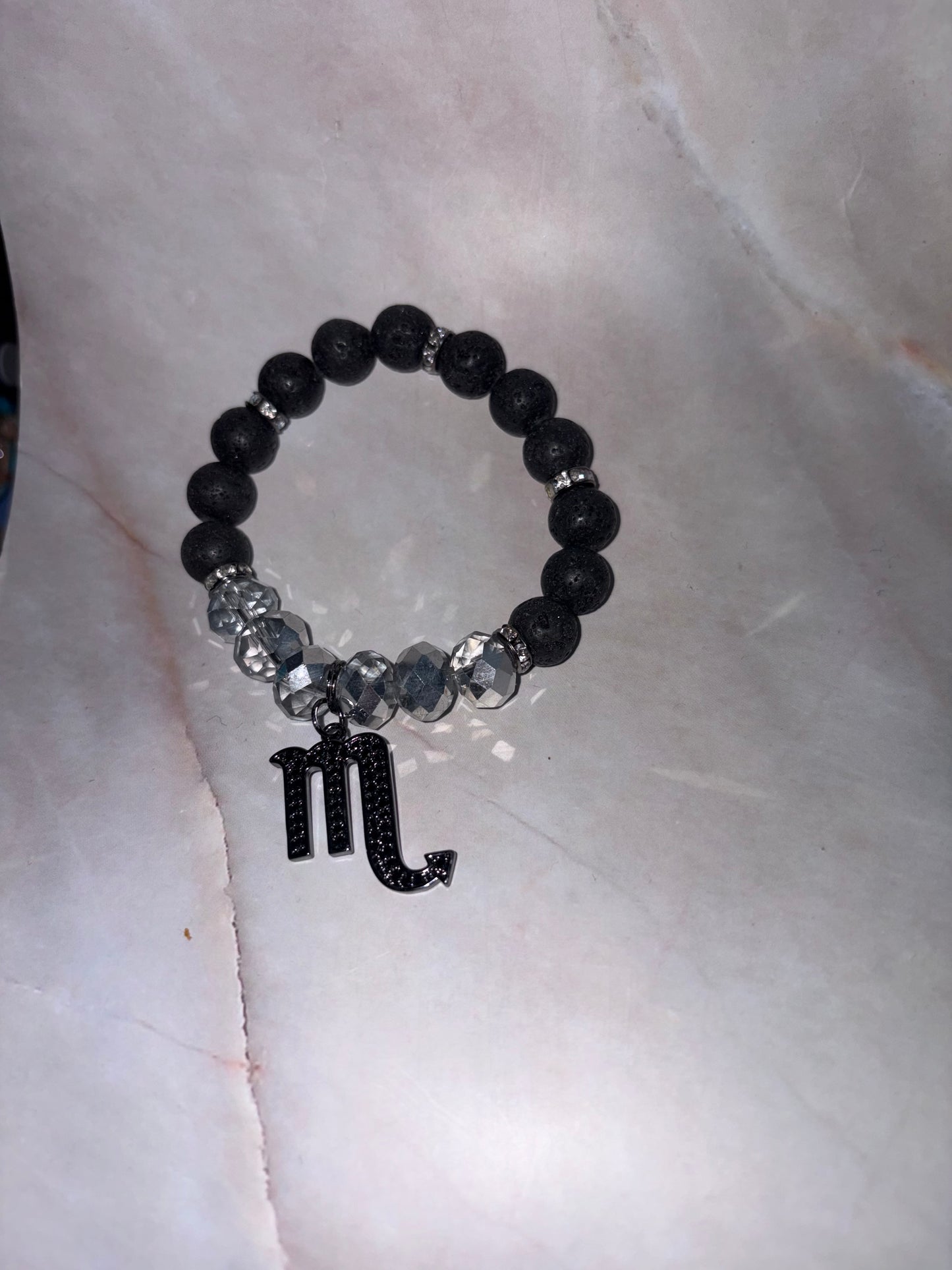 BLK Zodiac Bling Singles