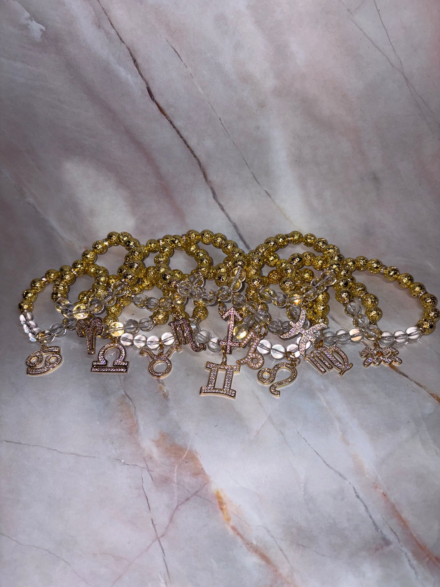 GLD Zodiac Bling Singles