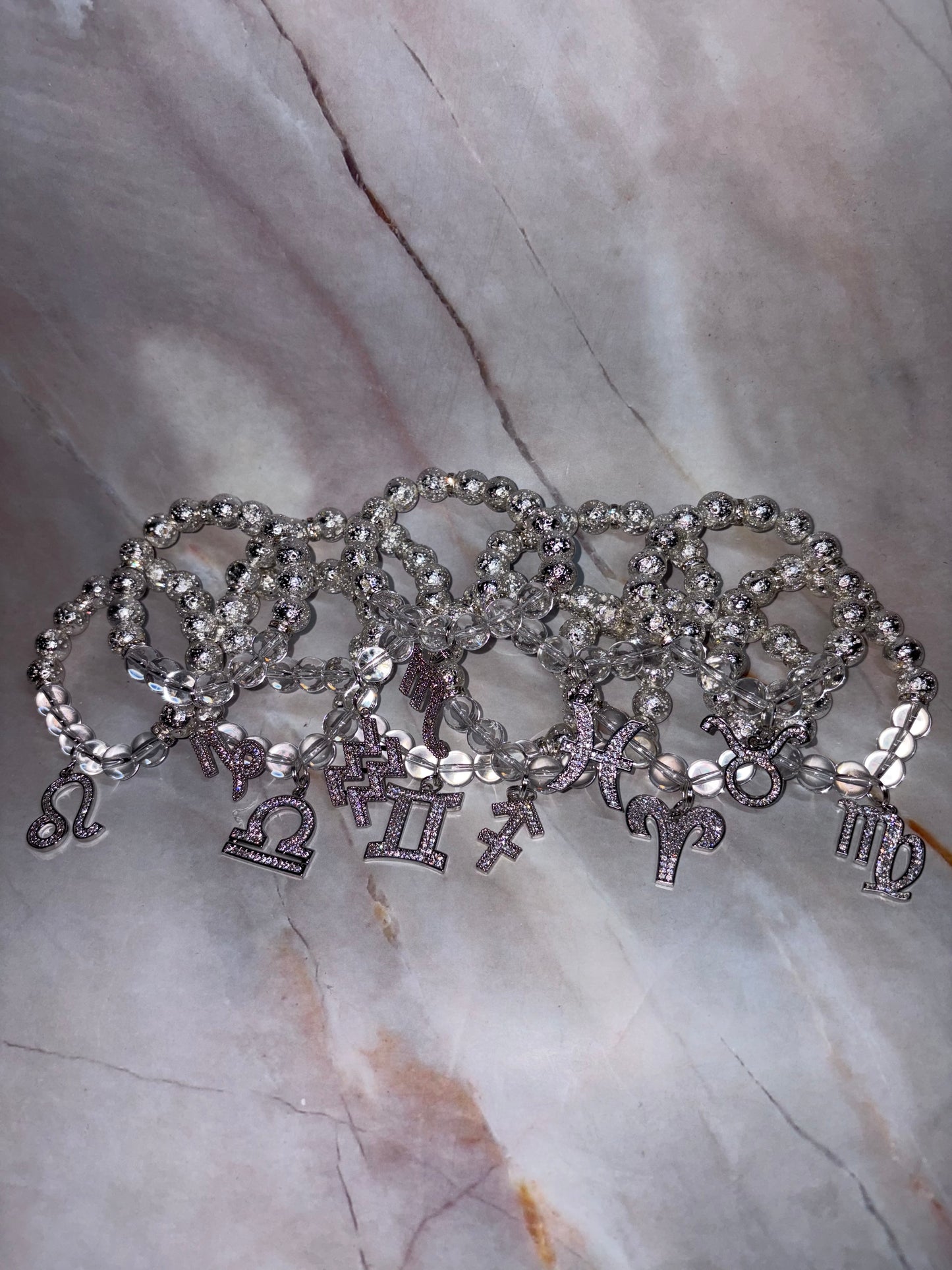 SIL Zodiac Bling Singles