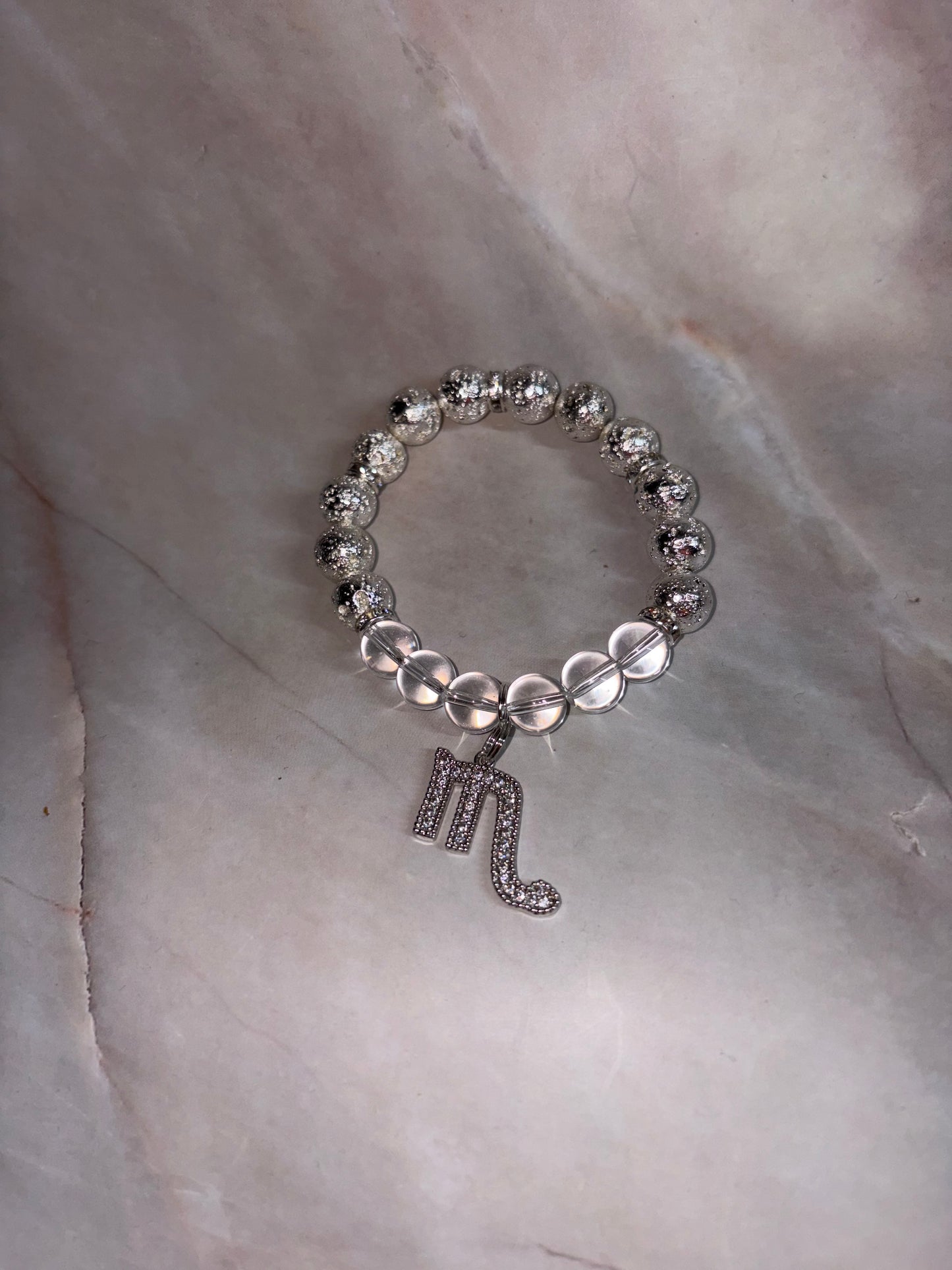 SIL Zodiac Bling Singles