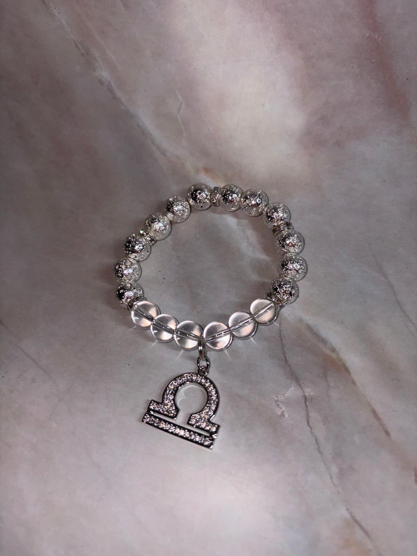 SIL Zodiac Bling Singles