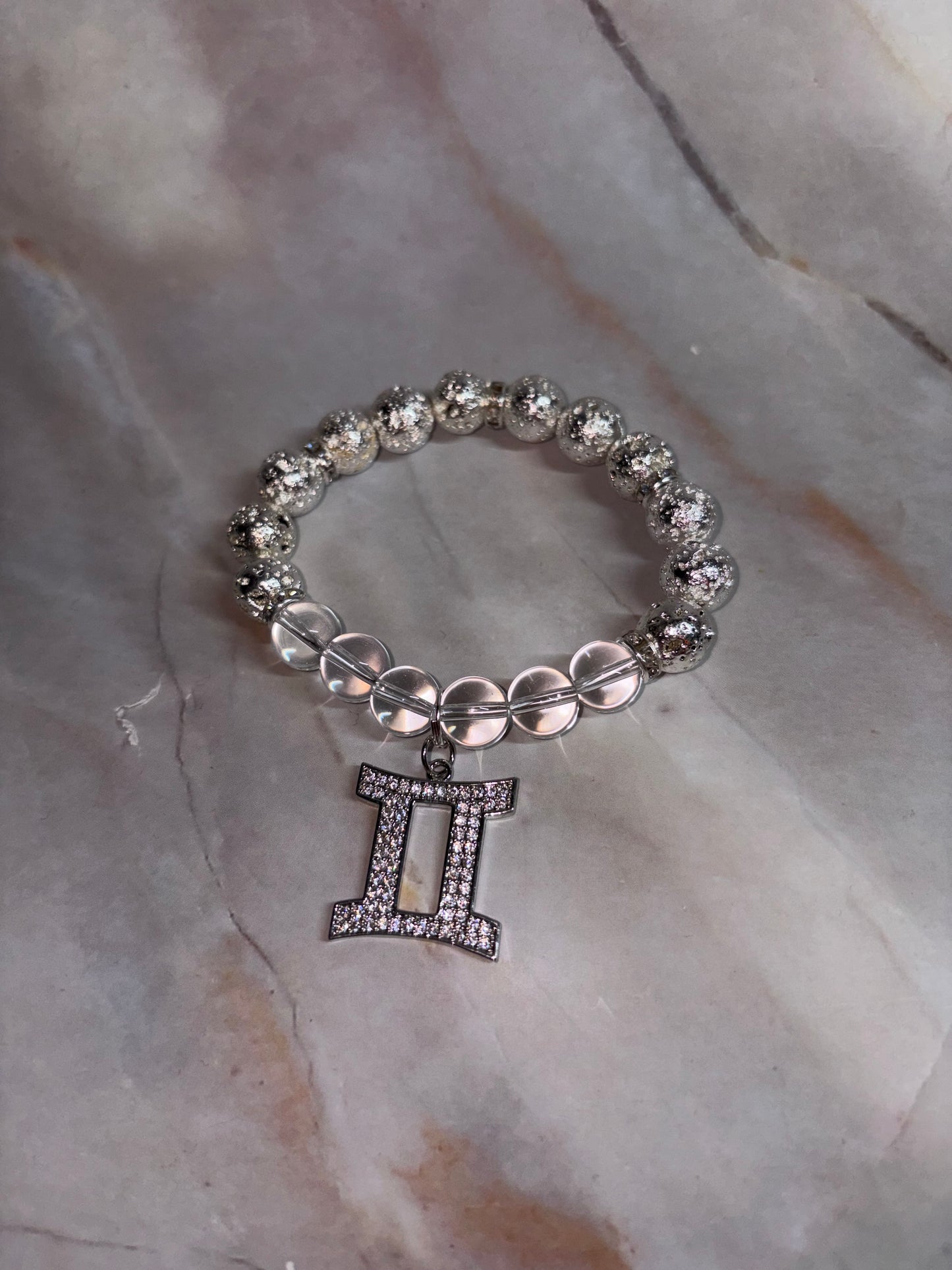 SIL Zodiac Bling Singles