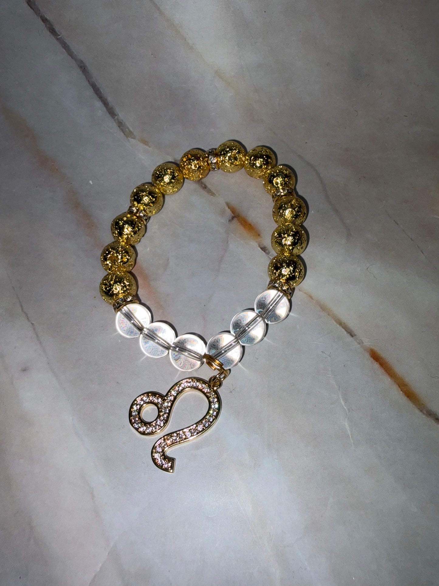 GLD Zodiac Bling Singles