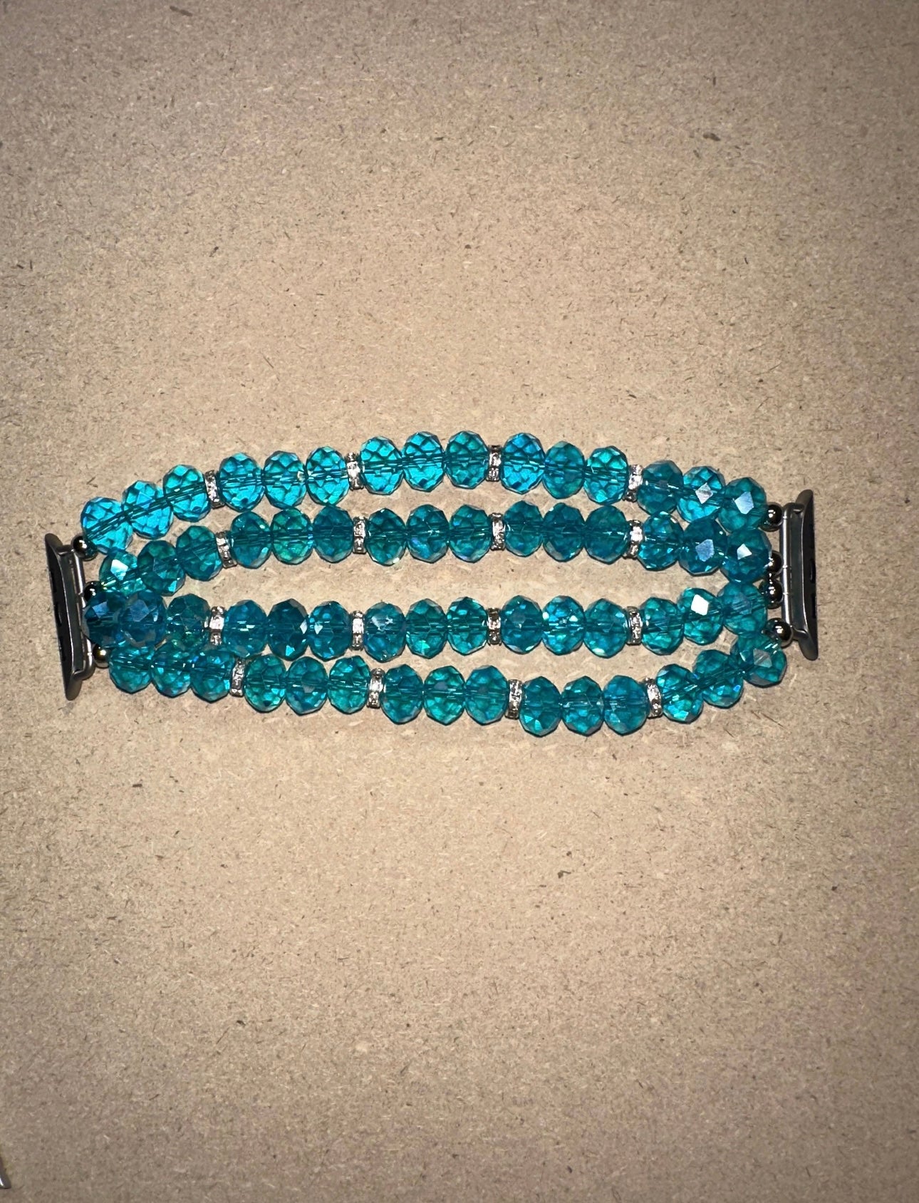 Teal Crystal 4Strand 42-49mm Apple